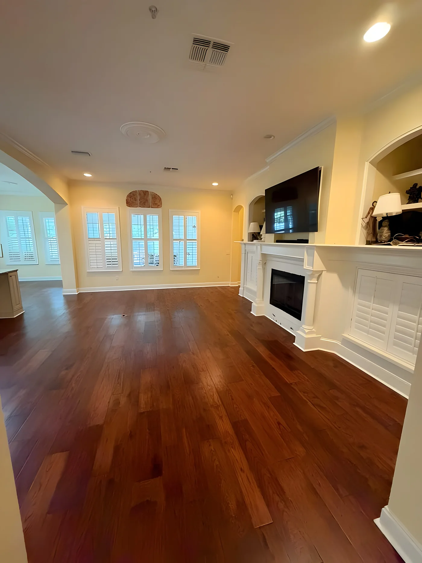 Finished hardwood living room floor installed by Braga Home Solution